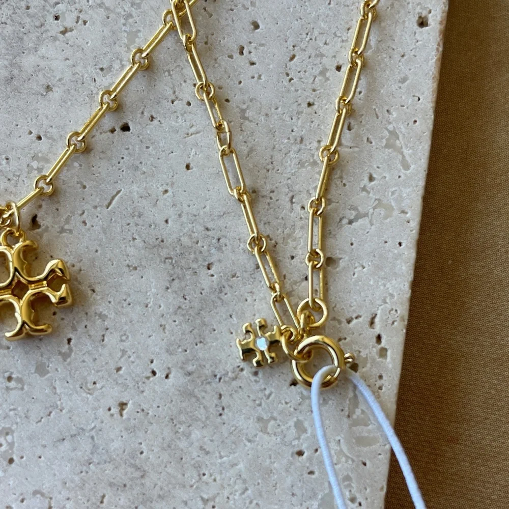 TORY BURCH Gold Pearl Charm Necklace - Elegant Women’s Jewelry - Picture 3 of 3